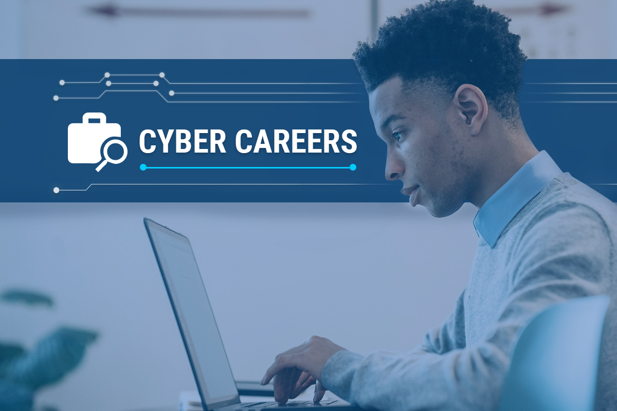 Man on laptop looking for a cyber career