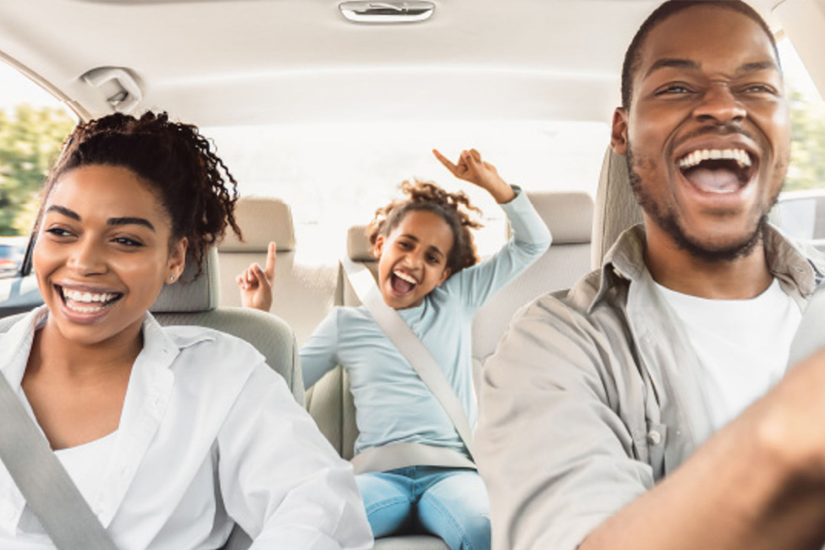 Image of family in car together