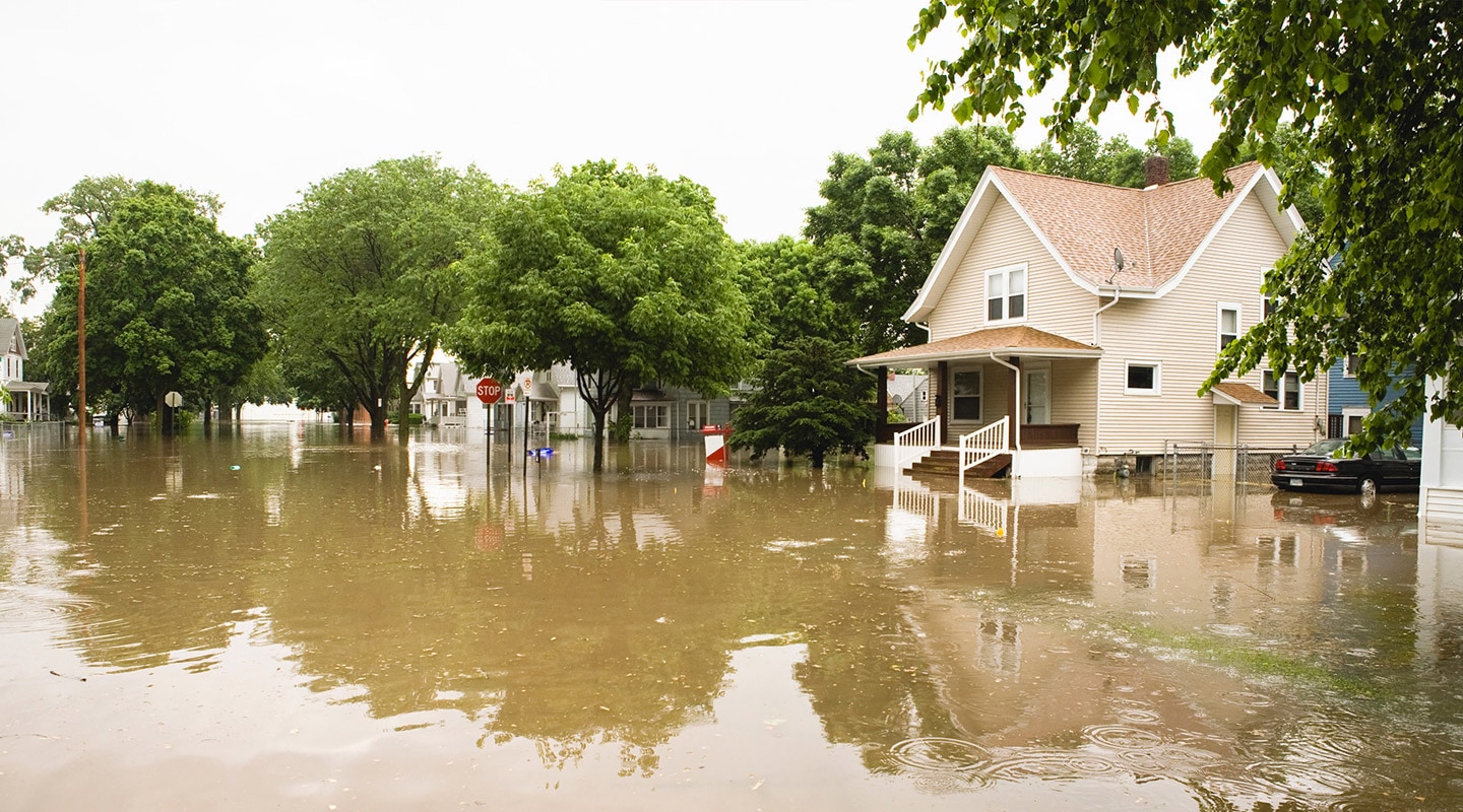Flooded house and street